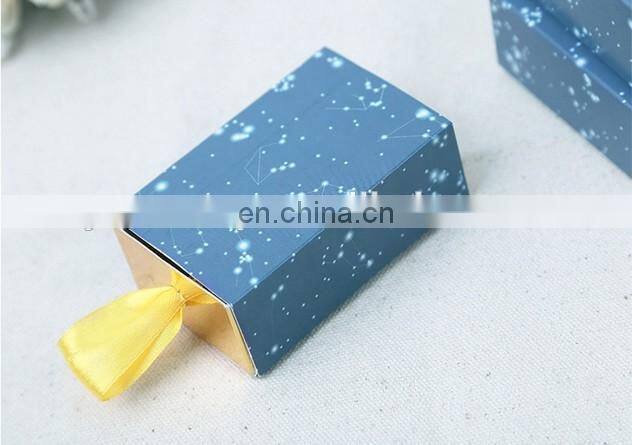 Just arrival constellation slide favor box with gold ribbon