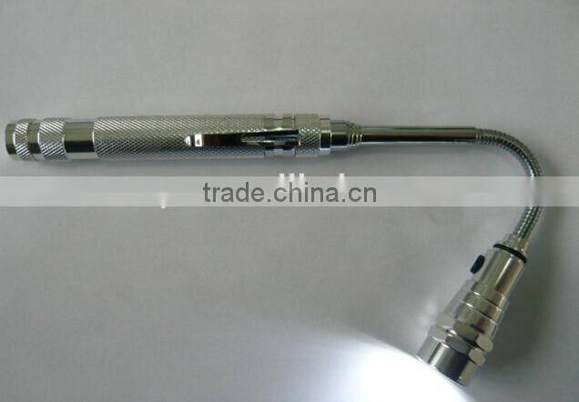 LED flashlight with telescopic magnetic pick-up tool
