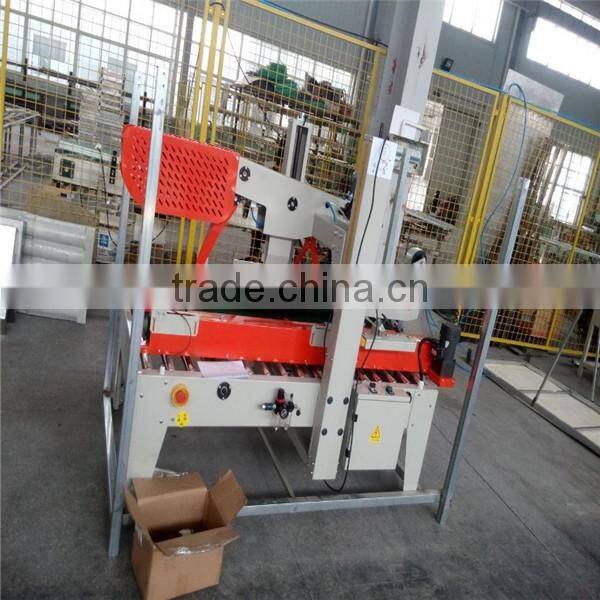 Automatic box sealing machine, automatic carton box sealing machine, carton box packing machine