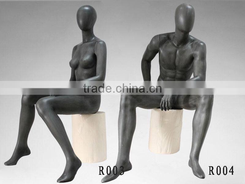 Abstract sex female sitting mannequin for window display