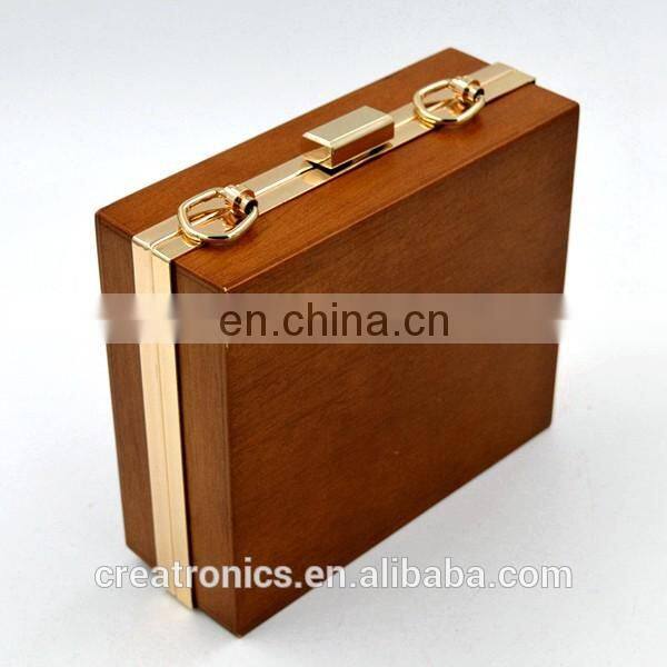 CR Factory OEM acceptable engraving patterns hollowed-out design metal frame long chain rectangled shaped wooden box clutch bag