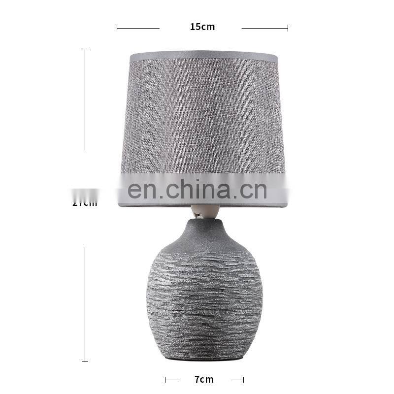 antique ceramic meterial beside table lamp