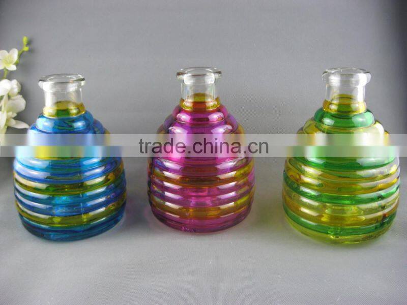 Hanging glass bee catcher with metal handle and wood cork stopper for home and garden use