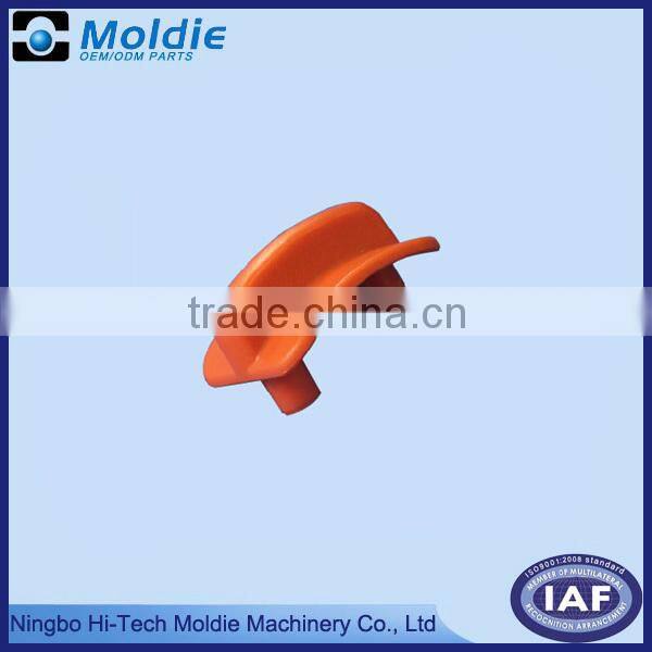 Red plastic button by injection molding