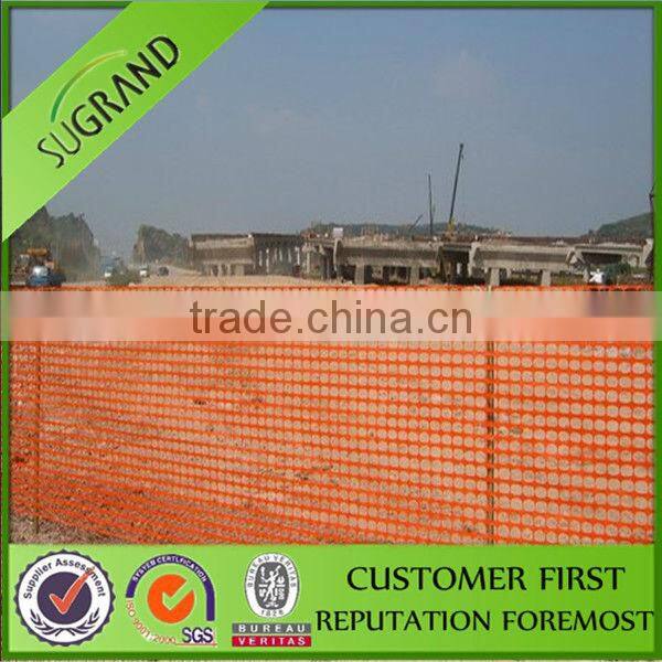 Orange plastic warning safety fence
