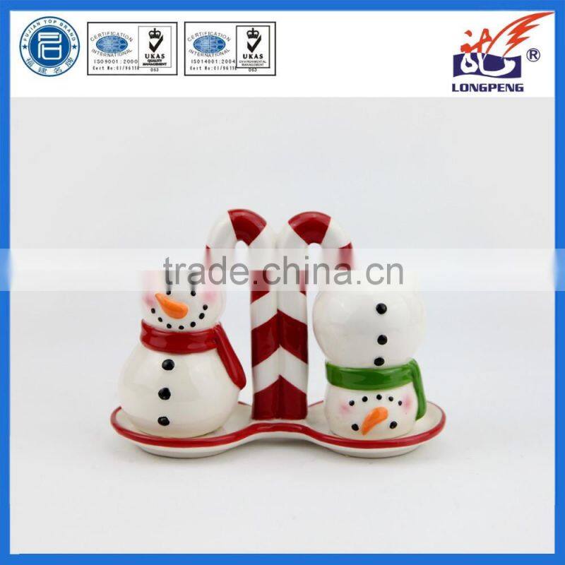 Christmas Holiday Salt & Pepper Shakers Snowman Stands On Base Ceramic Salt & Pepper Shaker Set
