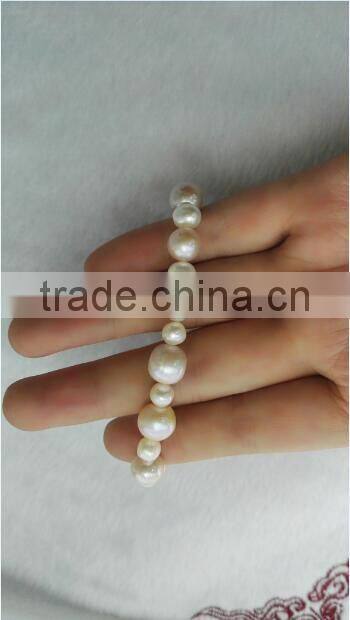 AA 3-4mm white and 8-9mm pink freshwater pearl bracelet