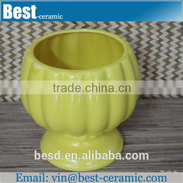 large plain yellow ceramic garden flower pot