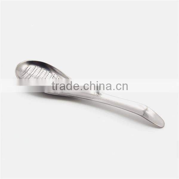 Spoon shaped ginger chocolate nutmeg garlic grater