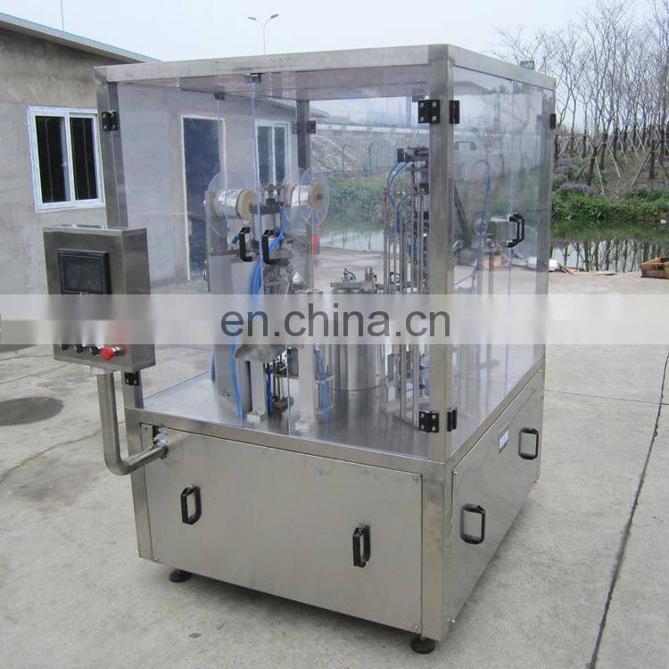 Rotary plastic cup filler and sealer machine