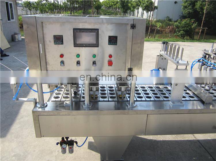 Automatic plastic cup sealing lid machine