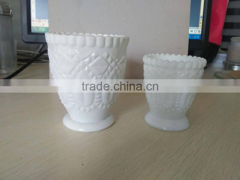 white cup shape candle jar