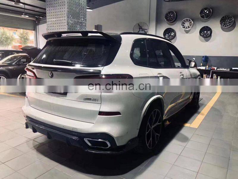 Runde Carbon Fiber Material Black Samurai Style Front Lip Rear Lip Side Skirt Grille Top Wing Spoiler For BMW X05 G05 Body Kit