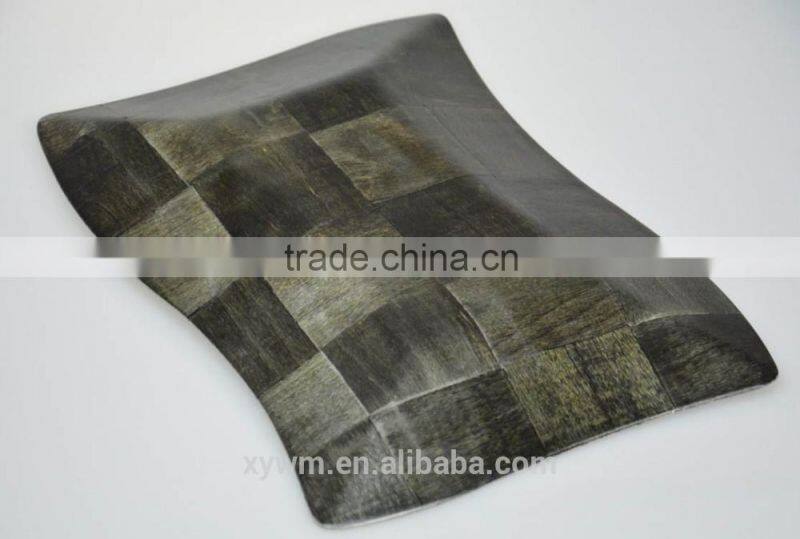 Black woven wooden serving tray and plate