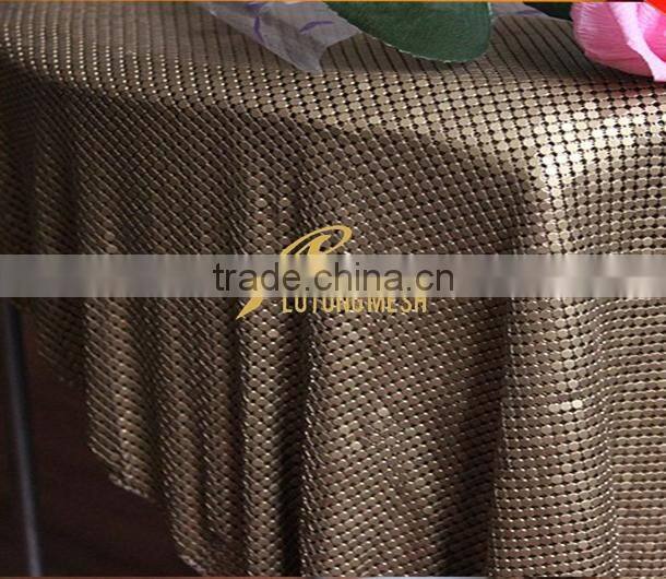 Metal sequin drapery for room divider