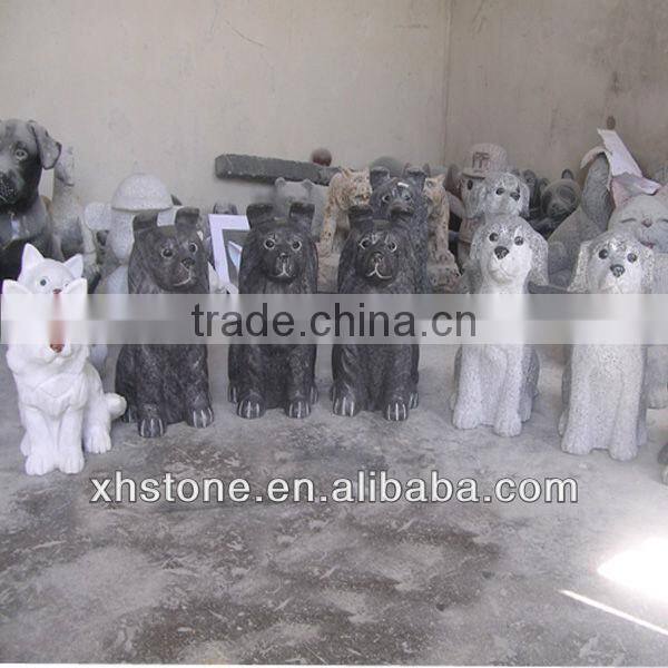 Black stone dog sculpture