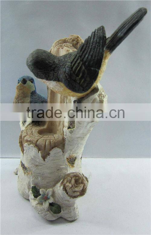 Polyresin antique bird figurine