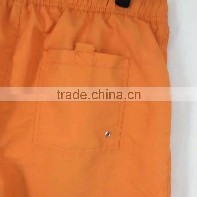 Men stocklots cheap orange beach shorts