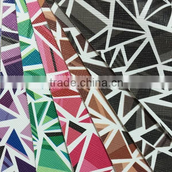 With film emboss surface ,PVC simili leather with geometric figure design , use for sofa ,chair cover ,handbags,upholstery