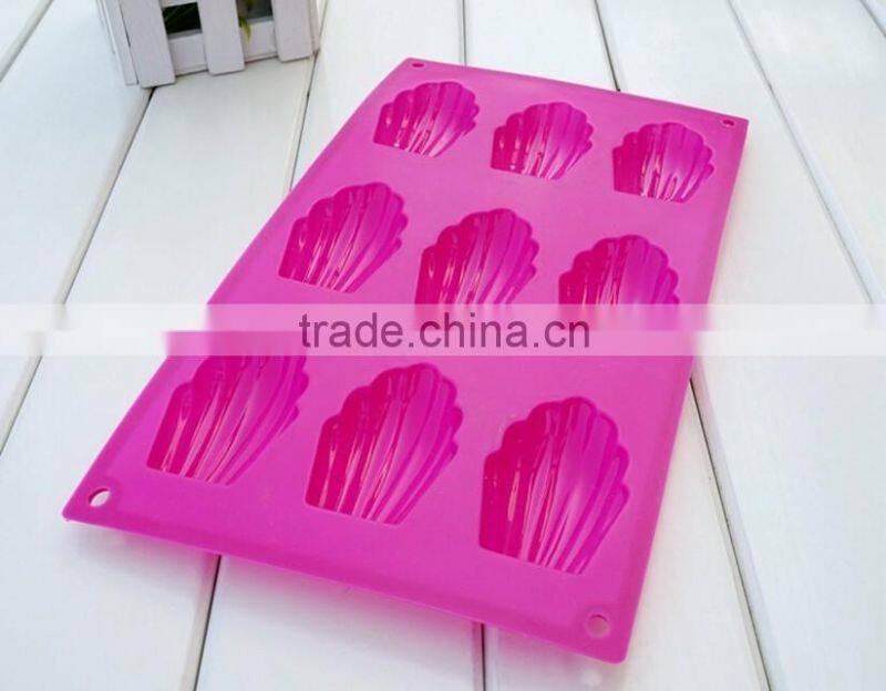 Hot sale food grade FDA and LFGB 9 hole shell shape colorful silicone oven cake mold