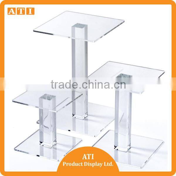 Hongkong supplier 3 steps clear round acrylic makeup products display riser