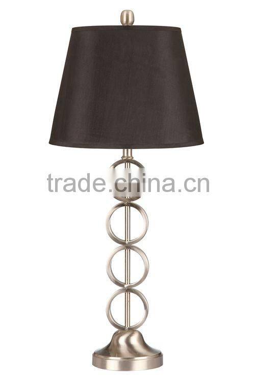 Four ring 32"H table lamp with black shade,brushed steel