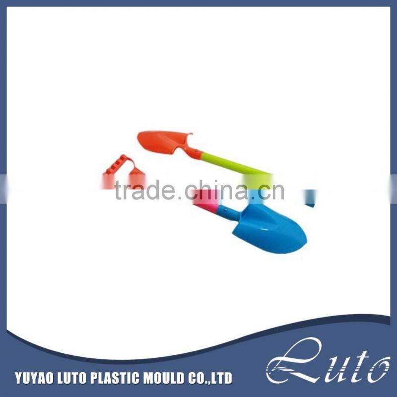 Summer holiday sand beach toy shovel and plastic buckets