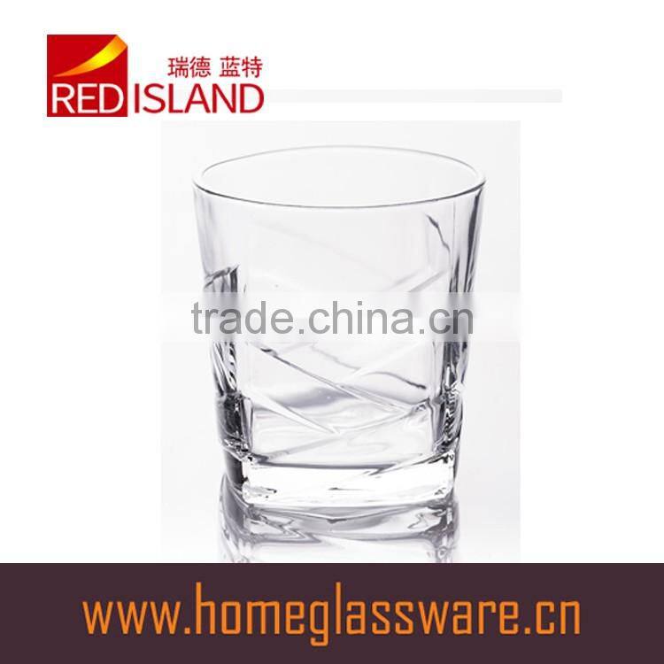 300ml clear glass cup with small bubbles at the bottom and embossed letter for drinking