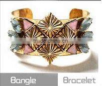 White And Champagne Crystals Acrylic Bowknow Bracelet