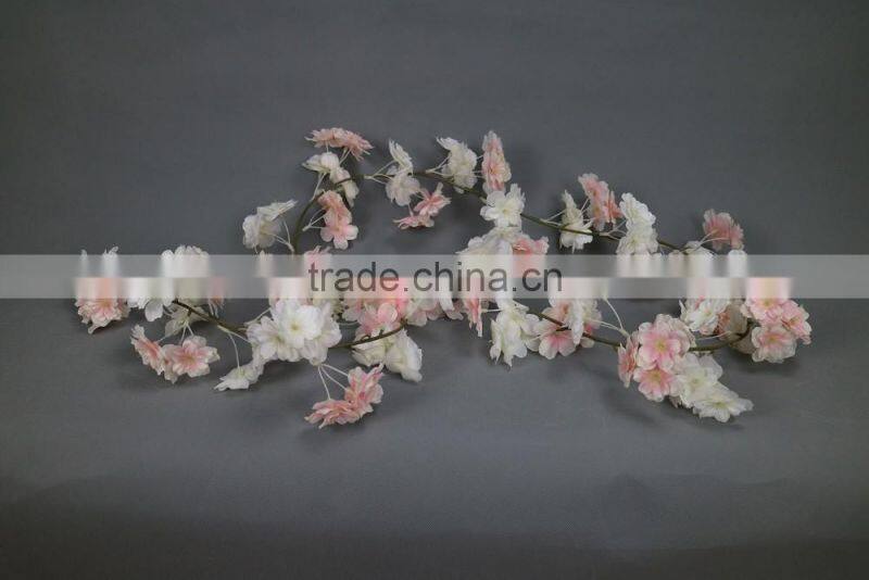 Artificial colourful cherry blossom garland for window display