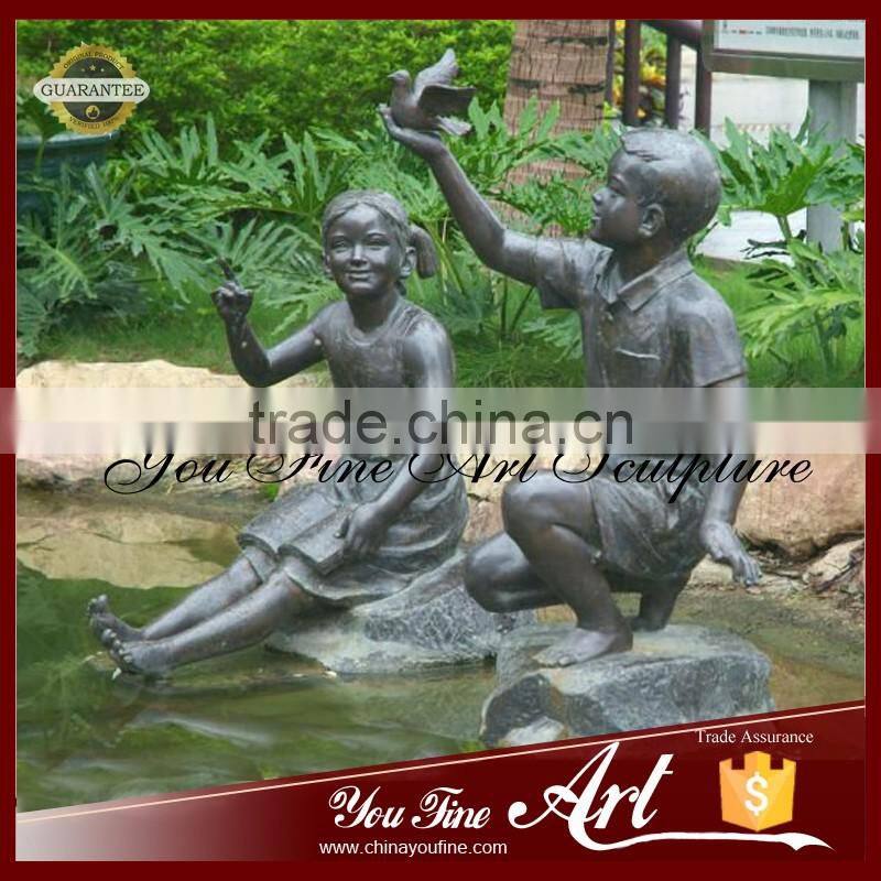 Hot Sale Metal Material Bronze Sitting Children With Bird