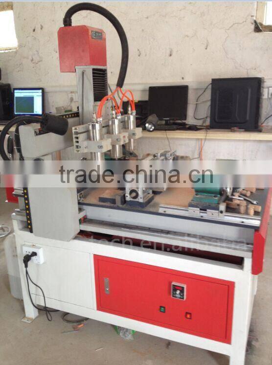 XJ6090 cnc router for wood aluminium metal carving with water tank