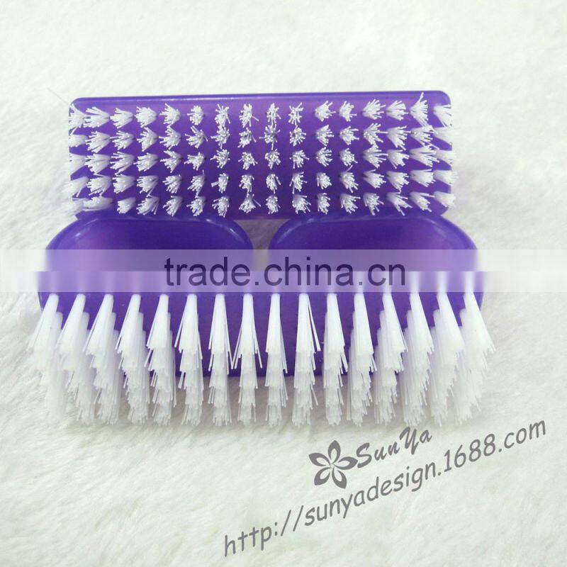 Purple plastic nail polish brush/nail care tools