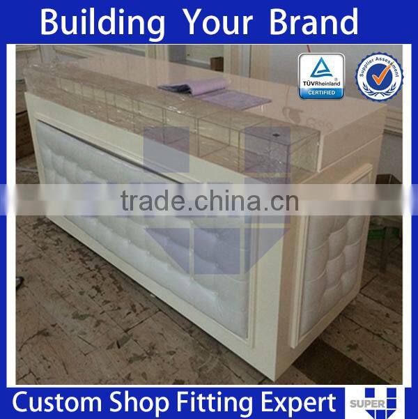 clothing store display design tailor made white modern reception desk
