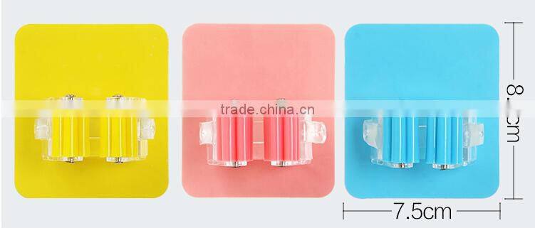 Wholesale Stock Magic Wall Suction Plastic Mop Handle Storage Holder
