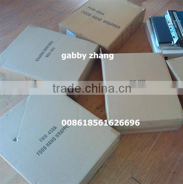 Cling film packing machine for supermarket