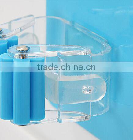 Wholesale Stock Magic Wall Suction Plastic Mop Handle Storage Holder