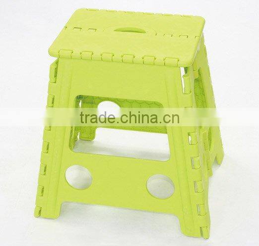 The colour of the stool is assorted folding step stool