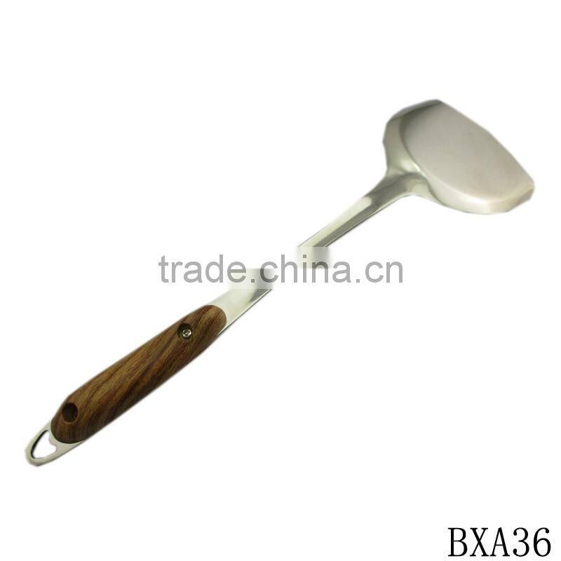 Professional stainless steel cooking spatula with wood handle