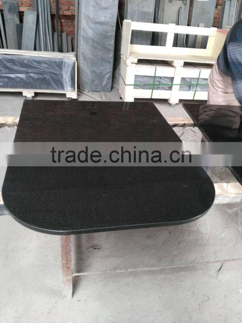 black granite hearth fireplace