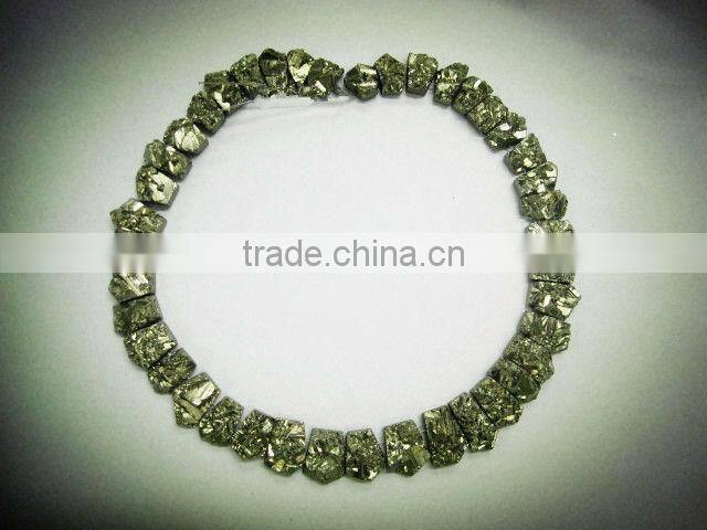 biack tourmaline rough coin