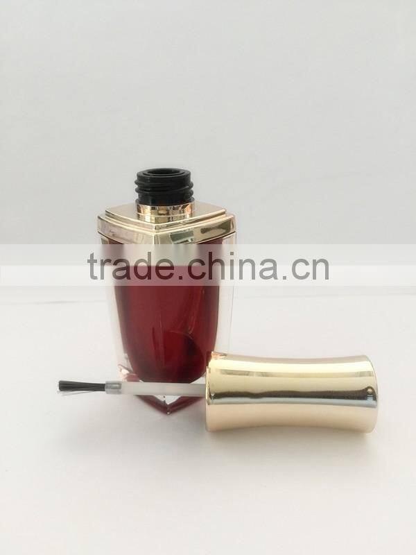 Red painted nail polish bottle with UV cap and shoulders