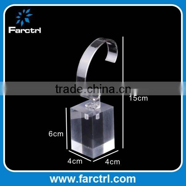 Clear acrylic bracelet watch display holder stand in retail shop