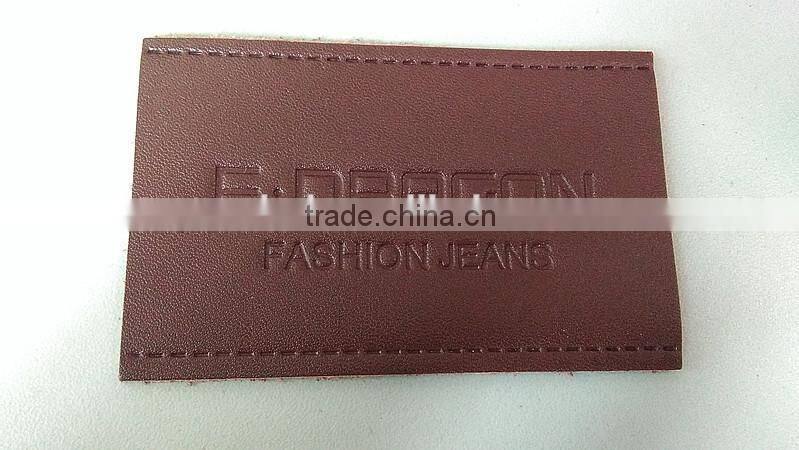 Wholesale embossed logo on PU leather patch for jeans and bags