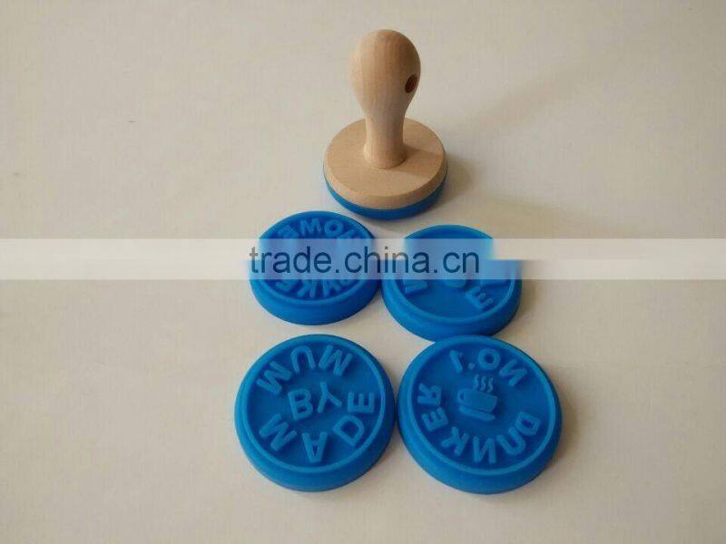 interesting silicone cookie stamp with wooden handle