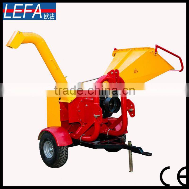 palm tree branch and trunk wood chipper