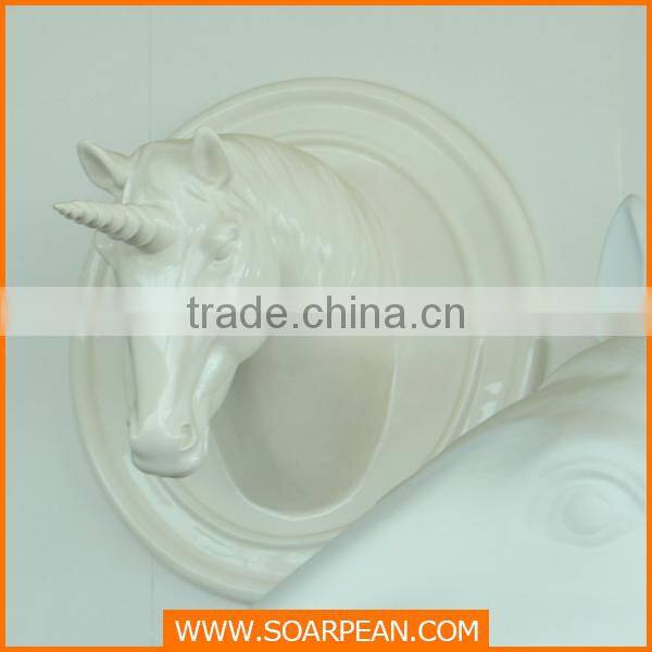 golden fiberglass horse head sculpture