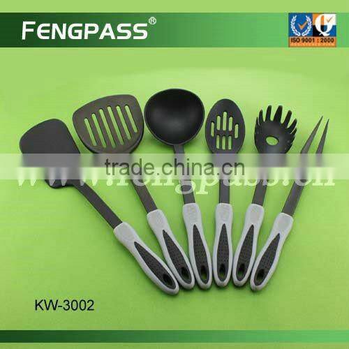 Stainless steel kitchen utensil with plastic handle