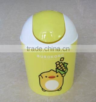 small round plastic litter bin