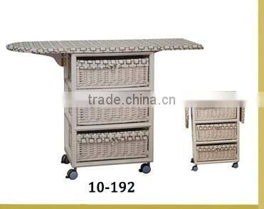 folding wooden ironing board in cabinet